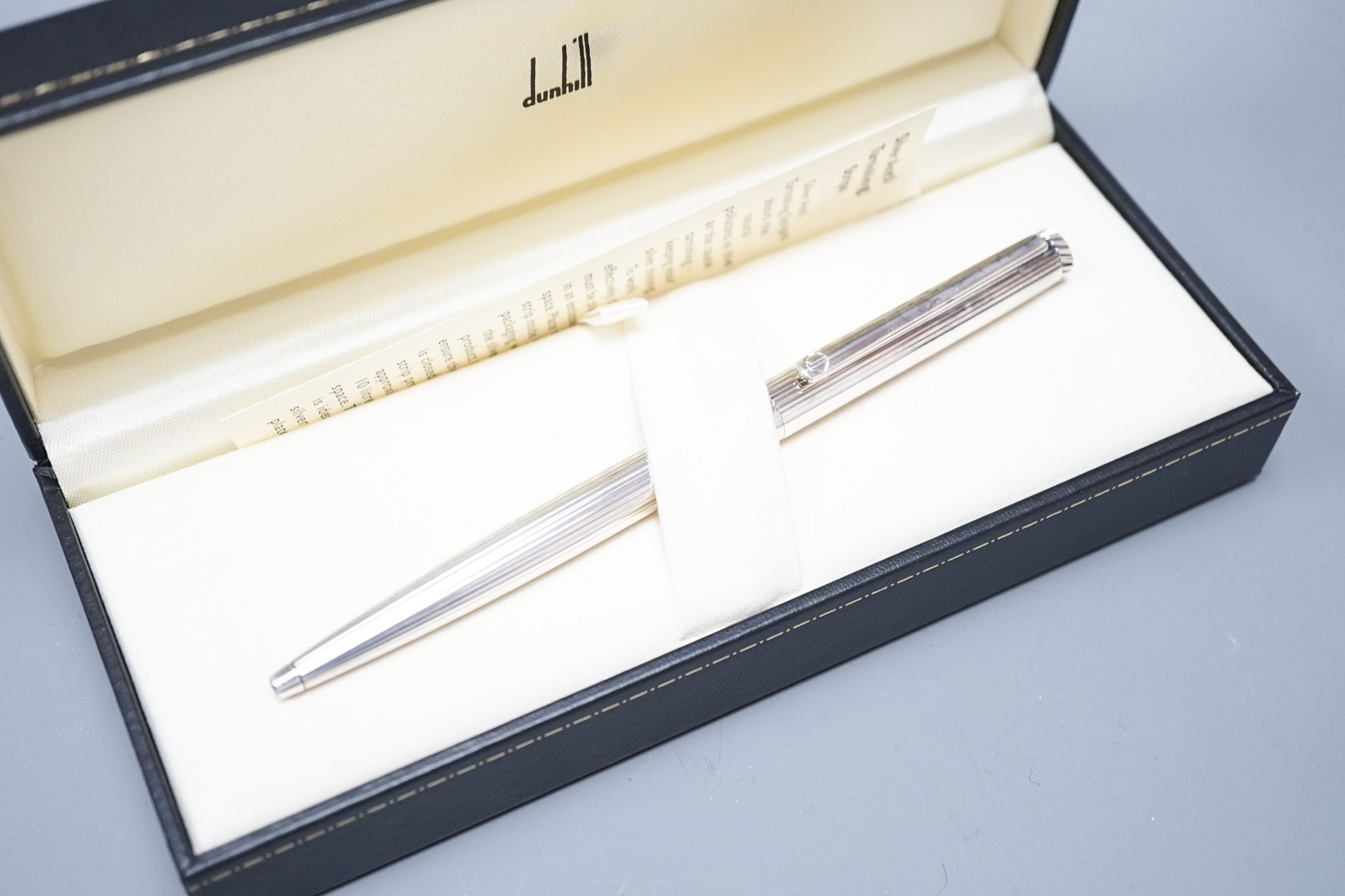 A Dunhill pen, boxed.